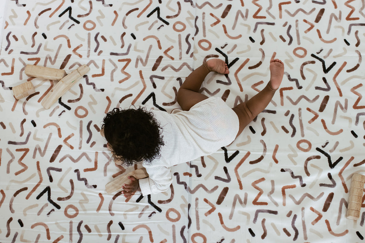 baby crawling on toki mats Blended play mat